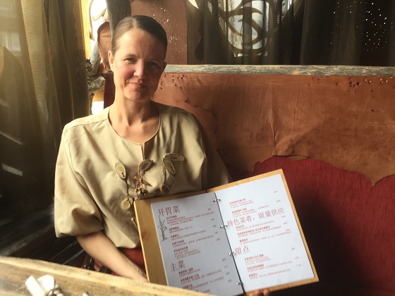 Katri Ruotsalainen, manager of Nili restaurant along with catalogue in Chinese language. DF Photo