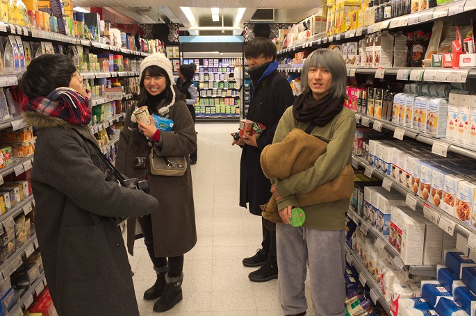 Foreign tourists at a city market.