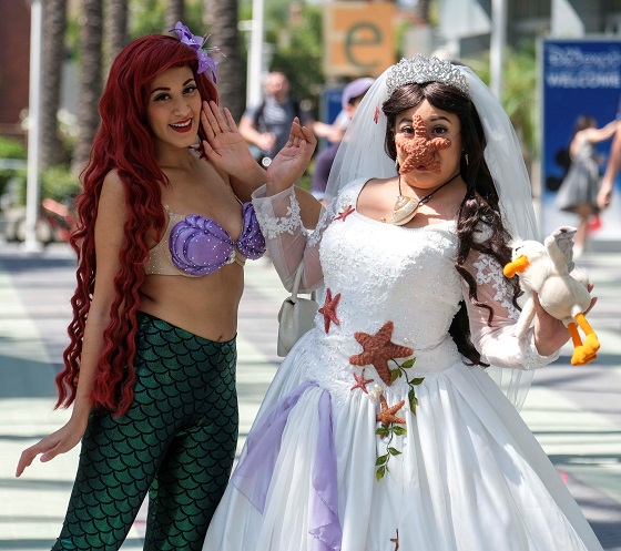 Cosplayers pose for photos during the D23 Expo fan convention at the convention center in Anaheim, California, the United States, on July 14, 2017. Photo Xinhua.