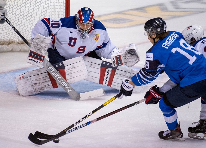 Team USA's goalie Cayden Primeau (L) prepares for a save during a match against Finland at the IIHF World Junior Championships in Vancouver, Canada, January, 5, 2019.Photo Xinhua by Andrew Soong.