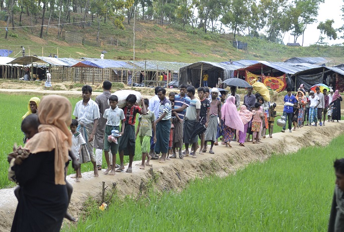 Rohingya refugees who were forced to leave their country by Myanmar security forces arrived in Bangladesh to save their lives. Photo Mostafizur Rahman.