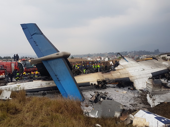 Photo taken on March 12, 2018 shows the crash-landing site in Kathmandu, Nepal. A passenger plane of the US-Bangla Airlines crashed at Nepal's Tribhuvan International Airport (TIA) on Monday. Photo Xinhua.
