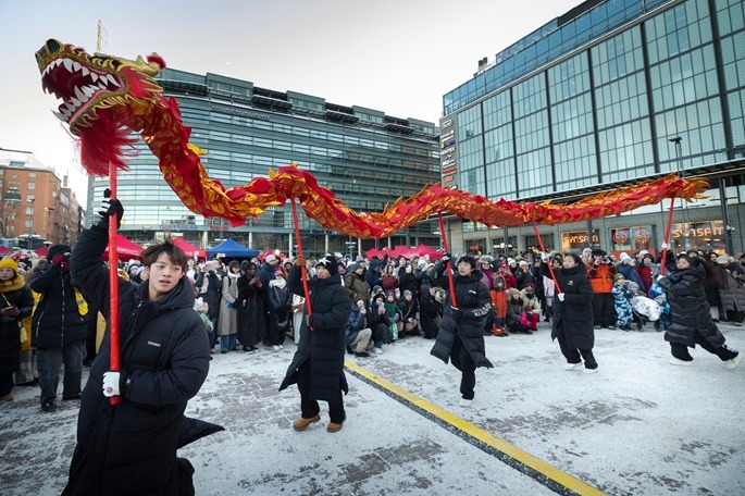 A dragon dance is staged during the 2026 Happy Chinese New Year folk fair in Helsinki on Friday. Photo: Xinhua by Matti Matikainen.