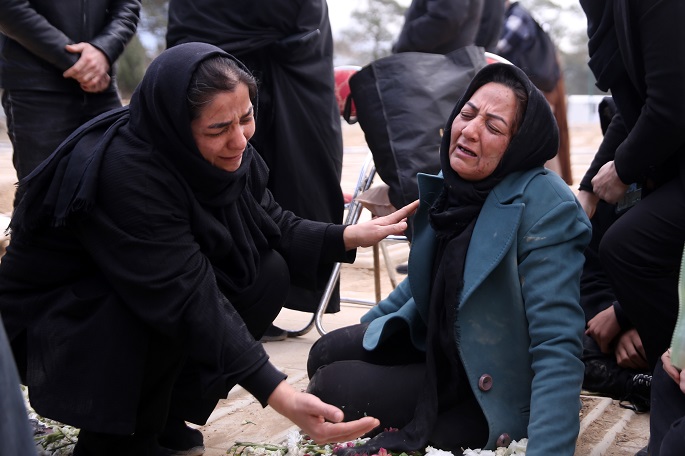 People mourn at a funeral held for people who lost their lives during strikes launched by the United States and Israel against Iran, at Behesht-e Zahra cemetery in Tehran, Iran, on March 9, 2026. Photo: Xinhua.