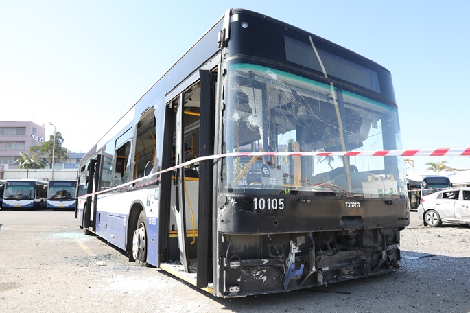 This photo taken on March 17, 2026 shows a damaged bus at an impact site of an Iranian missile attack in Holon, Israel. Photo: Gideon Markowicz/JINI via Xinhua.