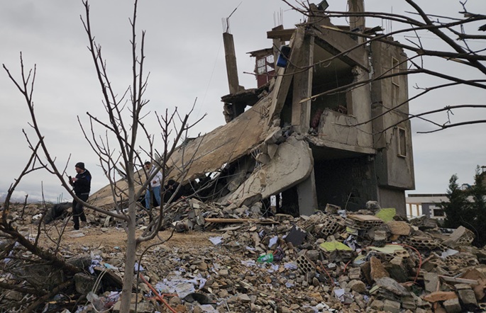 Photo taken with a mobile phone on March 19, 2026 shows buildings destroyed by Israeli airstrikes in the town of Chaat, eastern Lebanon. Photo: Xinhua by Taher Abu Hamdan.