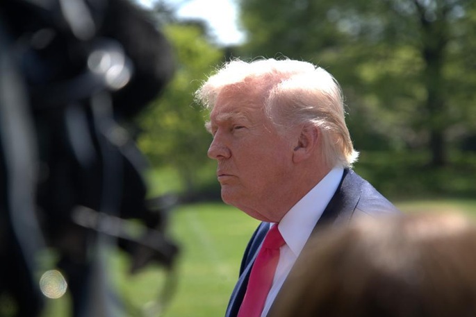 Trump says considering troop relocation from Italy