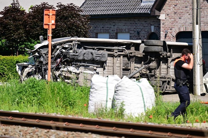 School bus, train collision kills 4 in Belgium