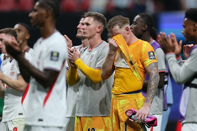 Goalkeeper Jordan Pickford (front R) of England reacts after the semifinal match with Argentina. Photo: Xinhua by Cao Can.